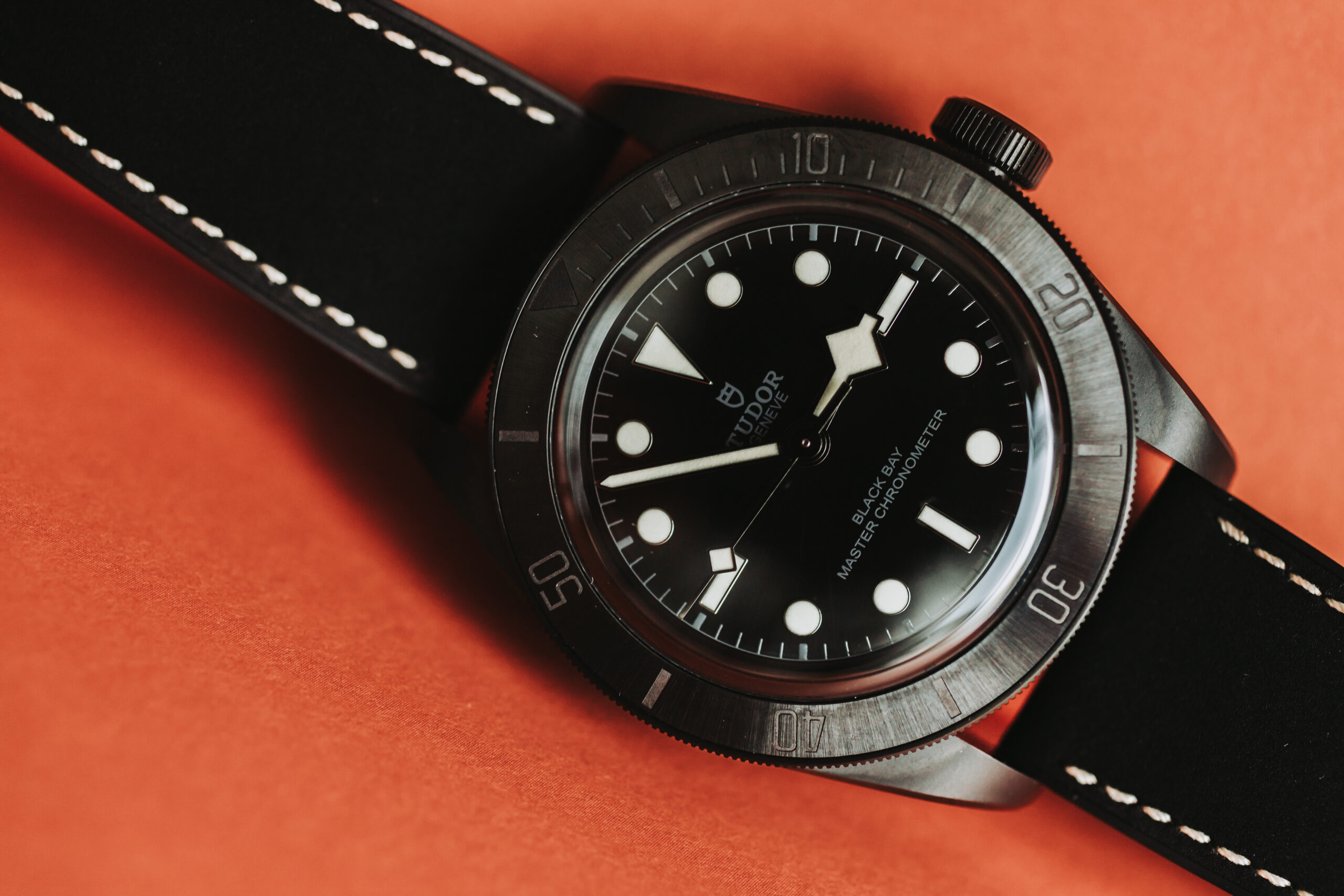TUDOR Black Bay Ceramic - Orange Background | Luxury Watch Brands