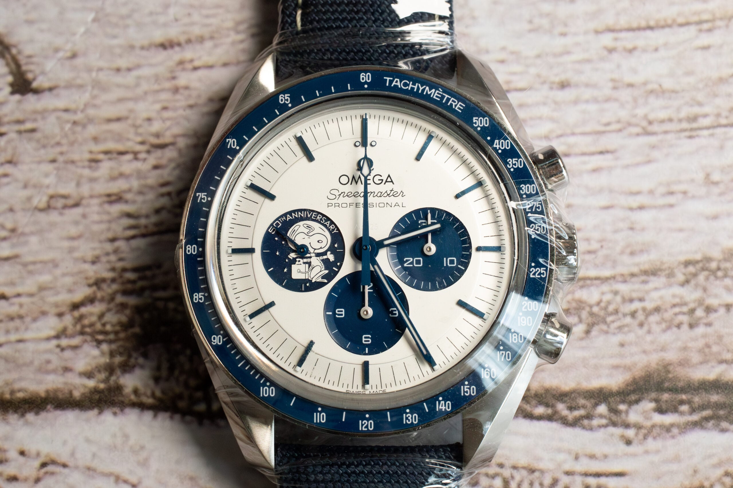 OMEGA Speedmaster Silver Snoopy Award 50th Anniversary Watch 310.32.42.50.02.001 Front Shot at MVS Watches